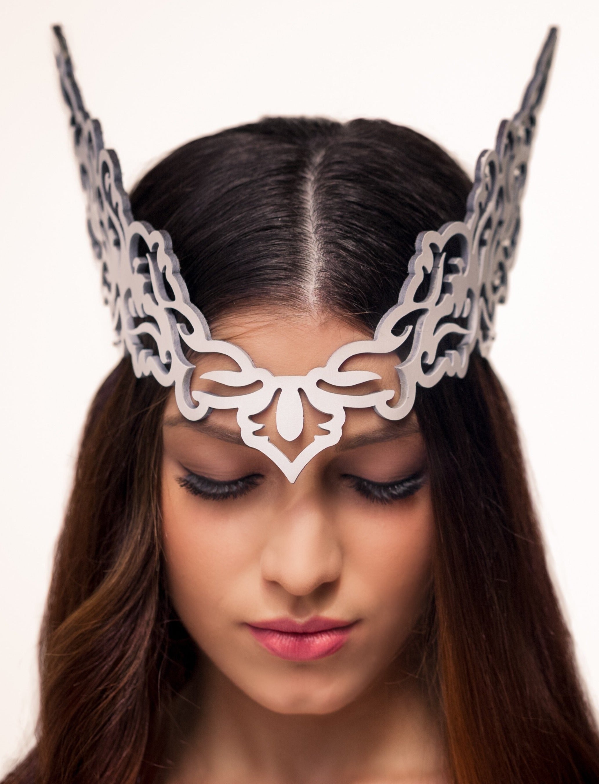 INVERTED HEADDRESS